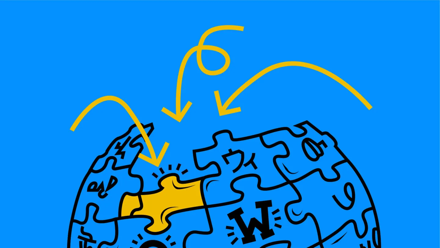 Grafik des Wikipedia-Balls, de aus verschiedenen Puzzleteilen besteht.