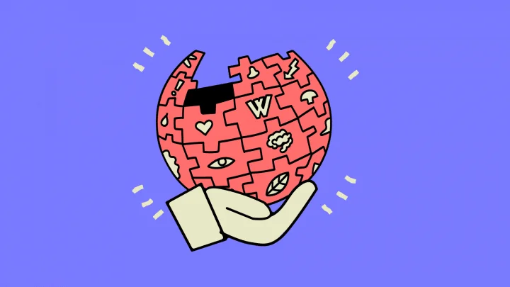 Grafik mit Wikipedia Globus auf Hand.